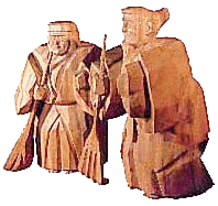 尉と姥をイメージした木彫り彫刻の写真